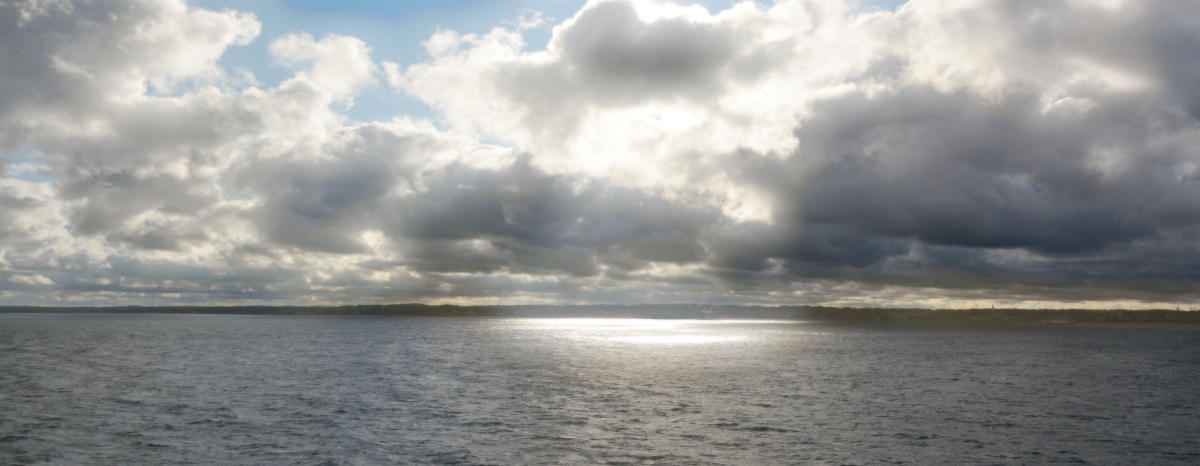 Sunlit Cloud Ocean Horizon